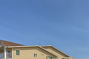 Community Building View with Benches Chehalis, Wa Apts for rent l Vintage at Chehalis Senior Apartments